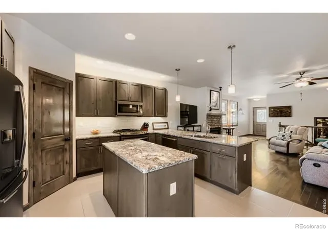 Photo 4 of Townhouse for sale at 820 13th Street, Berthoud, CO 80513 | MLS# IR1070017 | Listing updated on 2026-10-06
