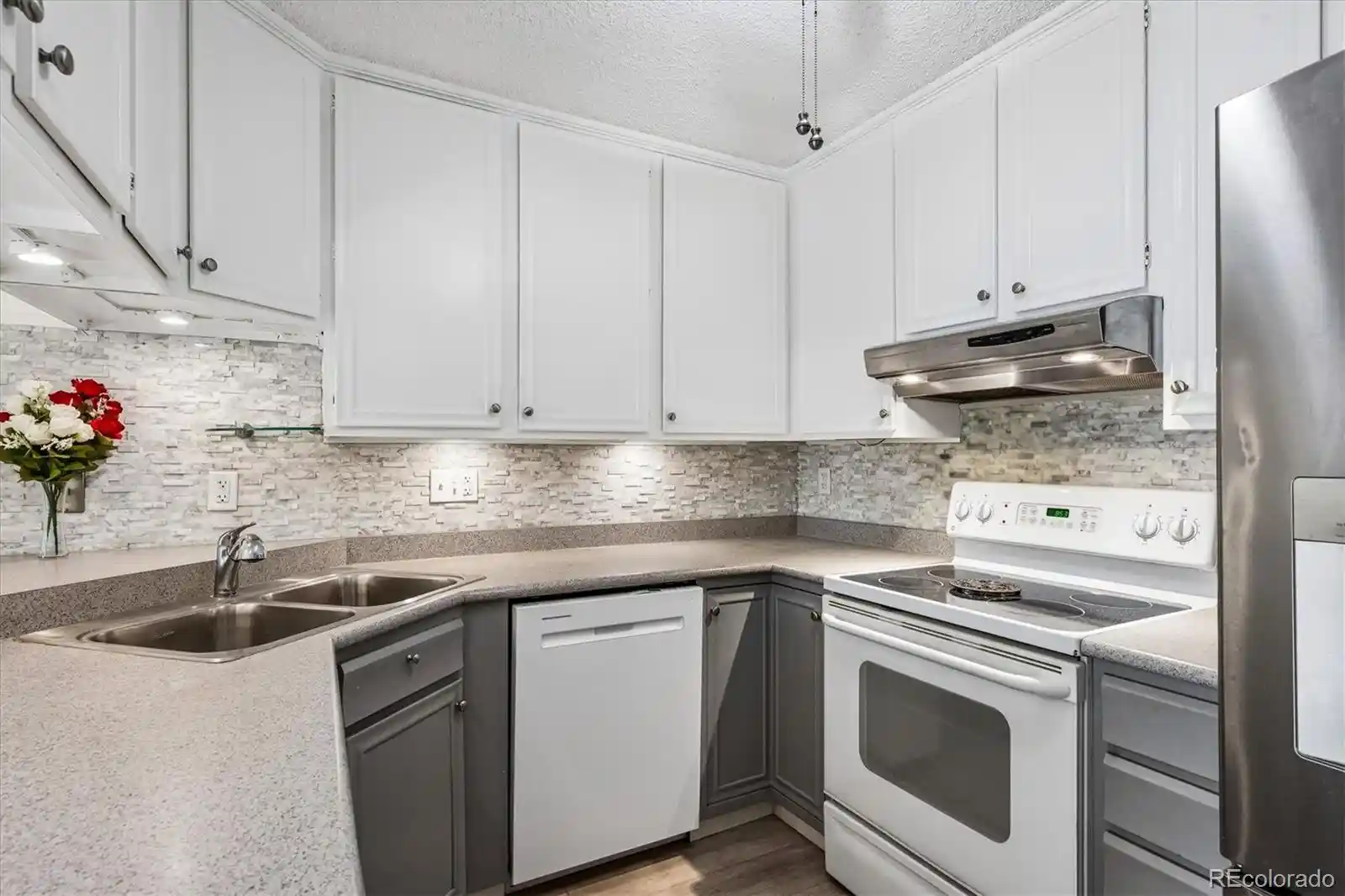Listing Photo 1 - Condo for sale in 3465 S Poplar St located at 3465 S Poplar St, Denver, CO 80224 - Unit #101