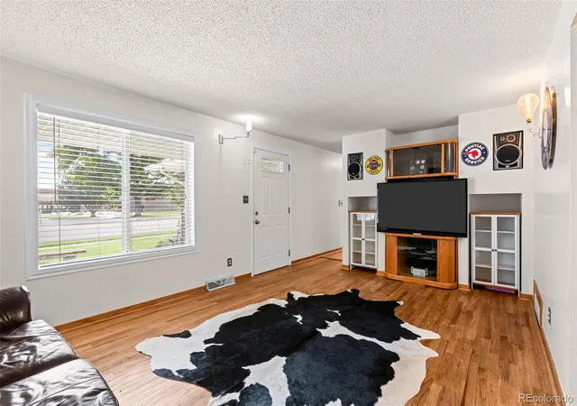 Photo 2 of Single family home for sale at 4503 S Quitman St, Denver, CO 80236 | MLS# 7311805 | Listing updated on 2026-10-07