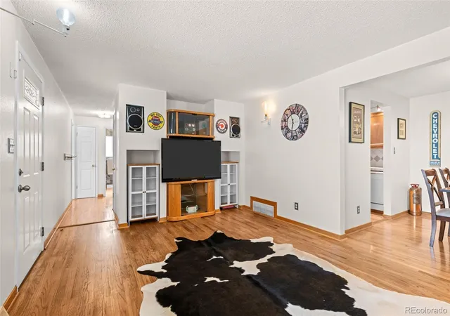Photo 3 of Single family home for sale at 4503 S Quitman St, Denver, CO 80236 | MLS# 7311805 | Listing updated on 2026-10-07