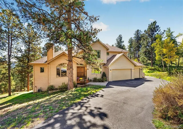 Photo 4 of Single family home for sale at 302 Cottonwood Dr, Evergreen, CO 80439 | MLS# 9779201 | Listing updated on 2026-10-07