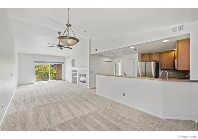 Photo 3 of Condo for sale at 1108 Olympia Ave #A, Longmont, CO 80504 | MLS# IR1070036 | Listing updated on 2026-10-07