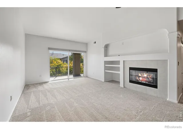 Photo 4 of Condo for sale at 1108 Olympia Ave #A, Longmont, CO 80504 | MLS# IR1070036 | Listing updated on 2026-10-07