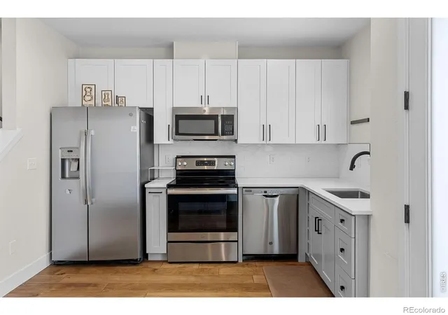 Photo 3 of Townhouse for sale at 1303 Osceola St, Denver, CO 80204 | MLS# IR1070049 | Listing updated on 2026-10-10