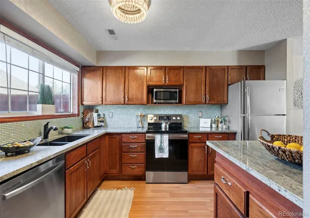 Listing Photo 5 - Condo for sale in building located at 3451 S Ammons St, Lakewood, CO 80227 - Unit #16-4