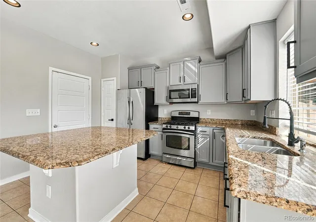Photo 3 of Single family home for sale at 4885 Halifax Ct, Denver, CO 80249 | MLS# 7251025 | Listing updated on 2026-10-16