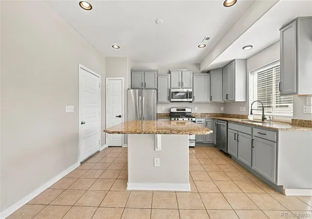Photo 3 of Single family home for sale at 4885 Halifax Ct, Denver, CO 80249 | MLS# 7251025 | Listing updated on 2026-10-16