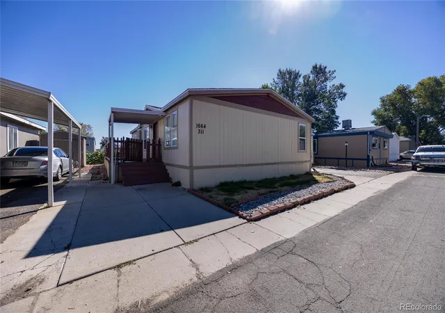 Manufactured home for sale at 1664 Van Buren Way, Aurora, CO 80011 | MLS# 8509284