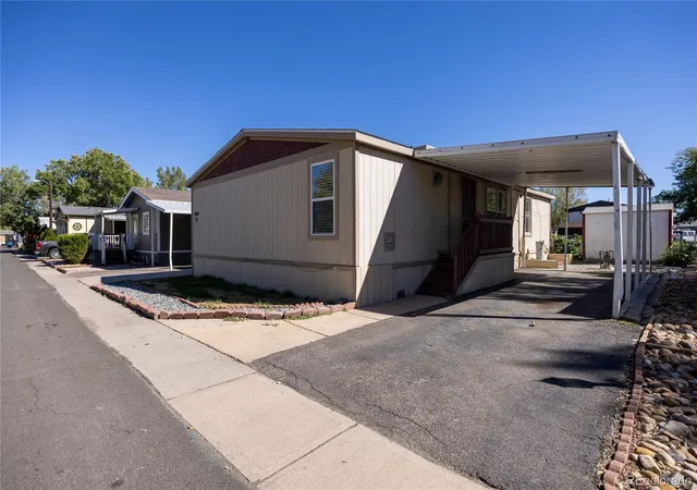 Photo 3 of Manufactured home for sale at 1664 Van Buren Way, Aurora, CO 80011 | MLS# 8509284 | Listing updated on 2026-10-06