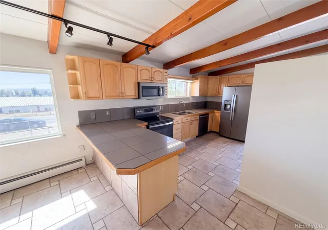 Photo 3 of Single family home for sale at 7811 W 62nd Avenue, Arvada, CO 80004 | MLS# 1922858 | Listing updated on 2026-10-08