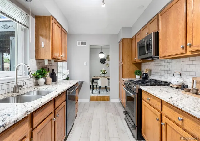 Photo 3 of Single family home for sale at 2101 Newport St, Denver, CO 80207 | MLS# 4274408 | Listing updated on 2026-10-16