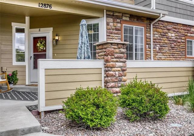 Photo 2 of Townhouse for sale at 12876 Jasmine St #E, Thornton, CO 80602 | MLS# 9003174 | Listing updated on 2026-10-07