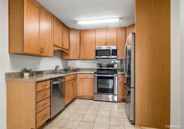 Photo 4 of Condo for sale at 9360 E Center Ave #12A, Denver, CO 80247 | MLS# 8537549 | Listing updated on 2026-10-11
