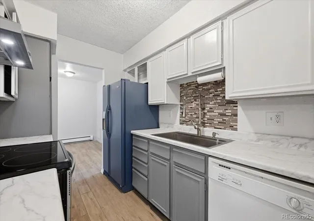 Photo 3 of Condo for sale at 4651 S Lowell Blvd #B, Denver, CO 80236 | MLS# 5582848 | Listing updated on 2026-10-10