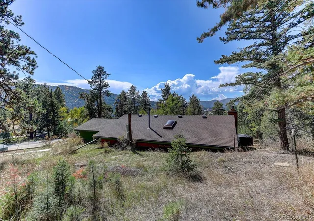 Photo 3 of Single family home for sale at 25561 Mosier Cir, Conifer, CO 80433 | MLS# 7827123 | Listing updated on 2026-10-08