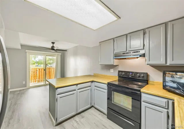 Photo 3 of Condo for sale at 1125 S Oneida St #A, Denver, CO 80224 | MLS# 5765631 | Listing updated on 2026-10-07