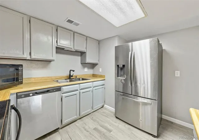 Photo 4 of Condo for sale at 1125 S Oneida St #A, Denver, CO 80224 | MLS# 5765631 | Listing updated on 2026-10-07