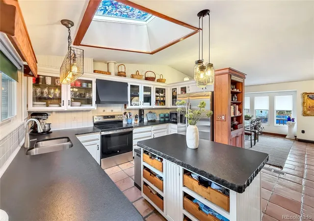 Photo 3 of Single family home for sale at 13232 W Layton Ave, Morrison, CO 80465 | MLS# 8063325 | Listing updated on 2026-10-15