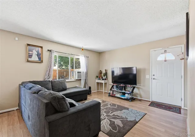 Photo 3 of Townhouse for sale at 1241 S Uvalda St, Aurora, CO 80012 | MLS# 6879232 | Listing updated on 2026-10-09