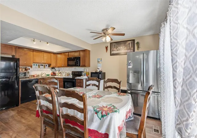 Photo 3 of Townhouse for sale at 1241 S Uvalda St, Aurora, CO 80012 | MLS# 6879232 | Listing updated on 2026-10-09