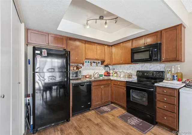 Photo 4 of Townhouse for sale at 1241 S Uvalda St, Aurora, CO 80012 | MLS# 6879232 | Listing updated on 2026-10-09