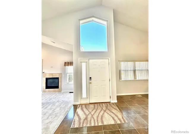 Listing Photo 4 - Condo for sale in building located at 15555 E 40Th Ave, Denver, CO 80239 - Unit #7