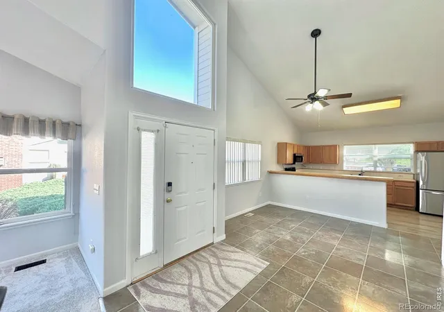 Listing Photo 5 - Condo for sale in building located at 15555 E 40Th Ave, Denver, CO 80239 - Unit #7
