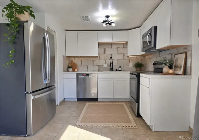 Photo 3 of Condo for sale at 1723 Robb St #33, Lakewood, CO 80215 | MLS# 5418366 | Listing updated on 2026-10-08