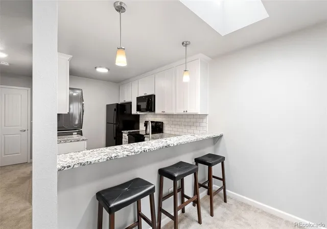 Photo 4 of Condo for sale at 7740 W 35th Avenue #311, Wheat Ridge, CO 80033 | MLS# 7480791 | Listing updated on 2026-10-09