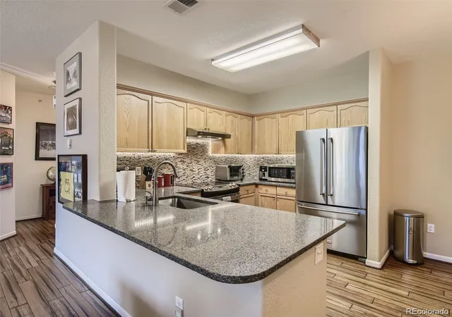 Photo 3 of Condo for sale at 8464 S Holland Way #205, Littleton, CO 80128 | MLS# 5628941 | Listing updated on 2026-10-19