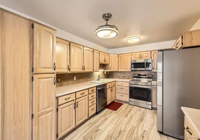 Photo 1 of Condo for sale at 9335 E Center Ave #4B, Denver, CO 80247 | MLS# 6350336 | Listing updated on 2026-10-12