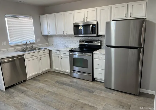 Listing Photo 5 - Condo for sale in building located at 15783 E 13th Pl, Aurora, CO 80011