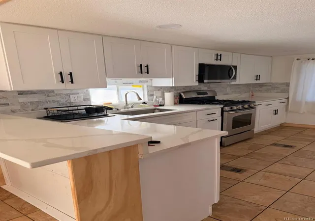Photo 3 of Manufactured home for sale at 2040 S Federal Blvd, Denver, CO 80219 | MLS# 9346992 | Listing updated on 2026-10-08