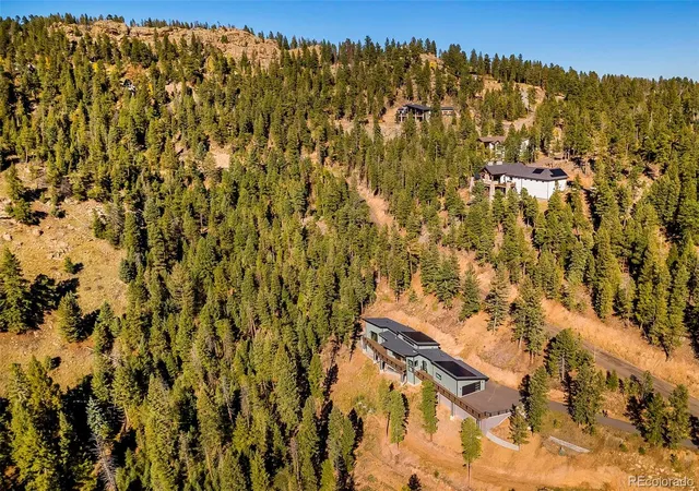 Photo 1 of Single family home for sale at 7231 Timber Trl Rd, Evergreen, CO 80439 | MLS# 4926298 | Listing updated on 2026-10-22