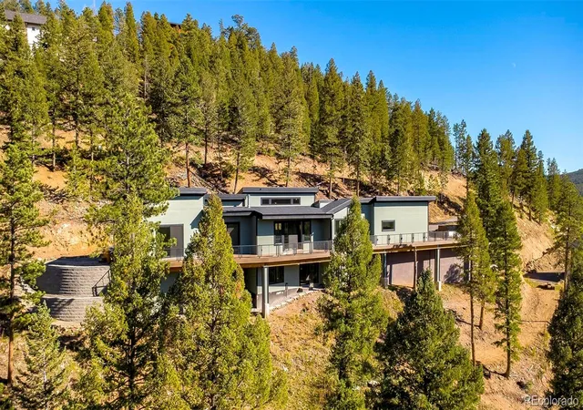 Photo 3 of Single family home for sale at 7231 Timber Trl Rd, Evergreen, CO 80439 | MLS# 4926298 | Listing updated on 2026-10-22