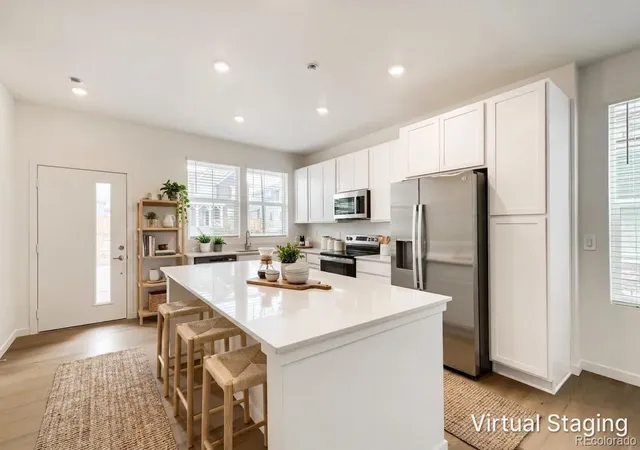 Photo 2 of Townhouse for sale at 15241 Clayton St, Thornton, CO 80602 | MLS# 6469804 | Listing updated on 2026-10-28