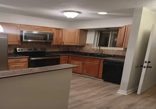 Photo 4 of Townhouse for sale at 14330 E Mississippi Ave #F, Aurora, CO 80012 | MLS# 8741802 | Listing updated on 2026-10-09