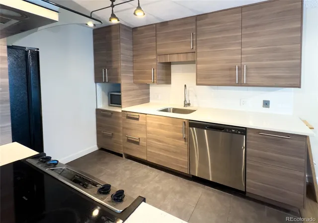 Photo 3 of Condo for sale at 3141 S Tamarac Dr #304F, Denver, CO 80231 | MLS# 3326074 | Listing updated on 2026-10-09