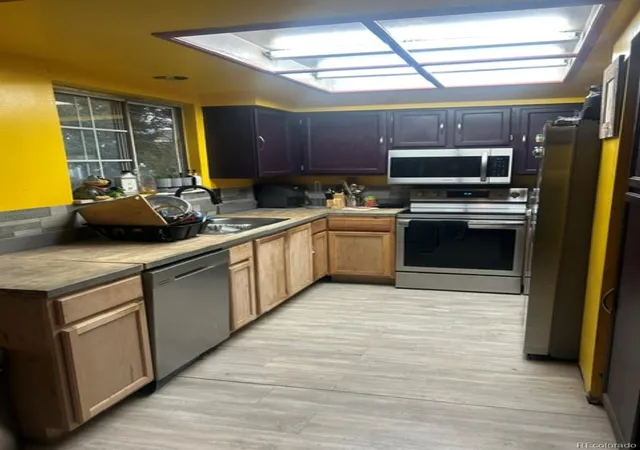 Photo 3 of Single family home for sale at 8252 Iris Ct, Arvada, CO 80005 | MLS# 7663562 | Listing updated on 2026-10-14