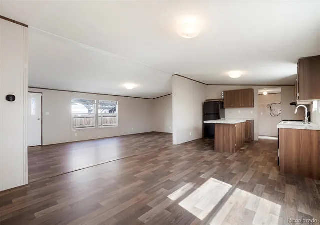 Photo 2 of Single family home for sale at 1104 Macdavidson Cir, Dacono, CO 80514 | MLS# 3843769 | Listing updated on 2026-10-09