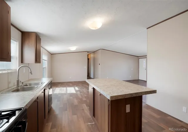 Photo 4 of Single family home for sale at 1104 Macdavidson Cir, Dacono, CO 80514 | MLS# 3843769 | Listing updated on 2026-10-09