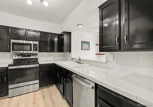 Photo 3 of Townhouse for sale at 7159 Depew Cir, Arvada, CO 80003 | MLS# 2352079 | Listing updated on 2026-10-10