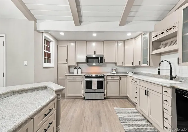 Photo 3 of Single family home for sale at 575 S Parfet St, Lakewood, CO 80226 | MLS# 4843147 | Listing updated on 2026-10-17