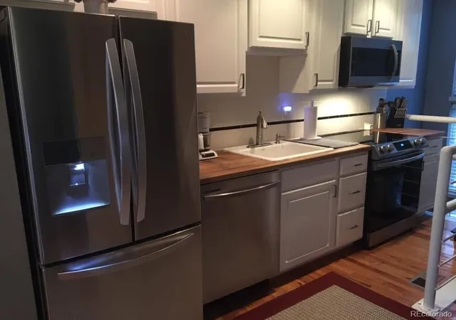 Photo 1 of Townhouse for sale at 1300 Garfield St #7, Denver, CO 80206 | MLS# 8982734 | Listing updated on 2026-10-10