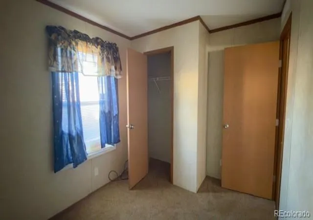 Photo 3 of Manufactured home for sale at 7701 Brighton Blvd, Commerce City, CO 80022 | MLS# 2322806 | Listing updated on 2026-10-10