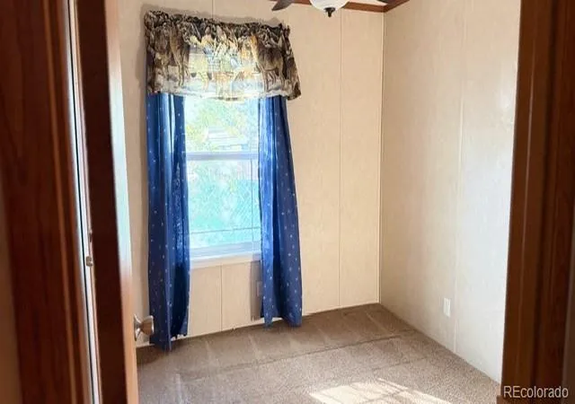 Photo 3 of Manufactured home for sale at 7701 Brighton Blvd, Commerce City, CO 80022 | MLS# 2322806 | Listing updated on 2026-10-10