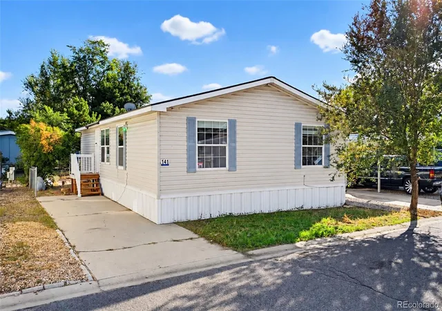 Photo 2 of Manufactured home for sale at 6500 E 88th Ave Lot 141, Henderson, CO 80640 | MLS# 8811371 | Listing updated on 2026-10-10