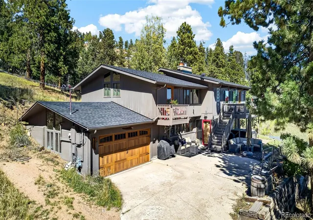Photo 3 of Single family home for sale at 12155 Cochise Cir, Conifer, CO 80433 | MLS# 7540456 | Listing updated on 2026-10-10