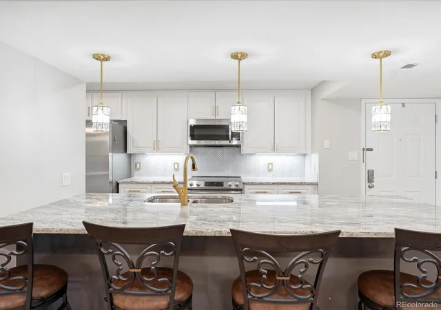 Photo 2 of Condo for sale at 7000 E Quincy Ave #105, Denver, CO 80237 | MLS# 9719032 | Listing updated on 2026-10-11