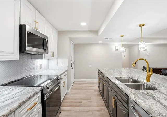 Photo 3 of Condo for sale at 7000 E Quincy Ave #105, Denver, CO 80237 | MLS# 9719032 | Listing updated on 2026-10-11